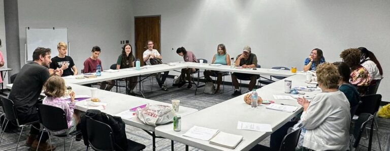 The Rock Hill library writing group around its tables